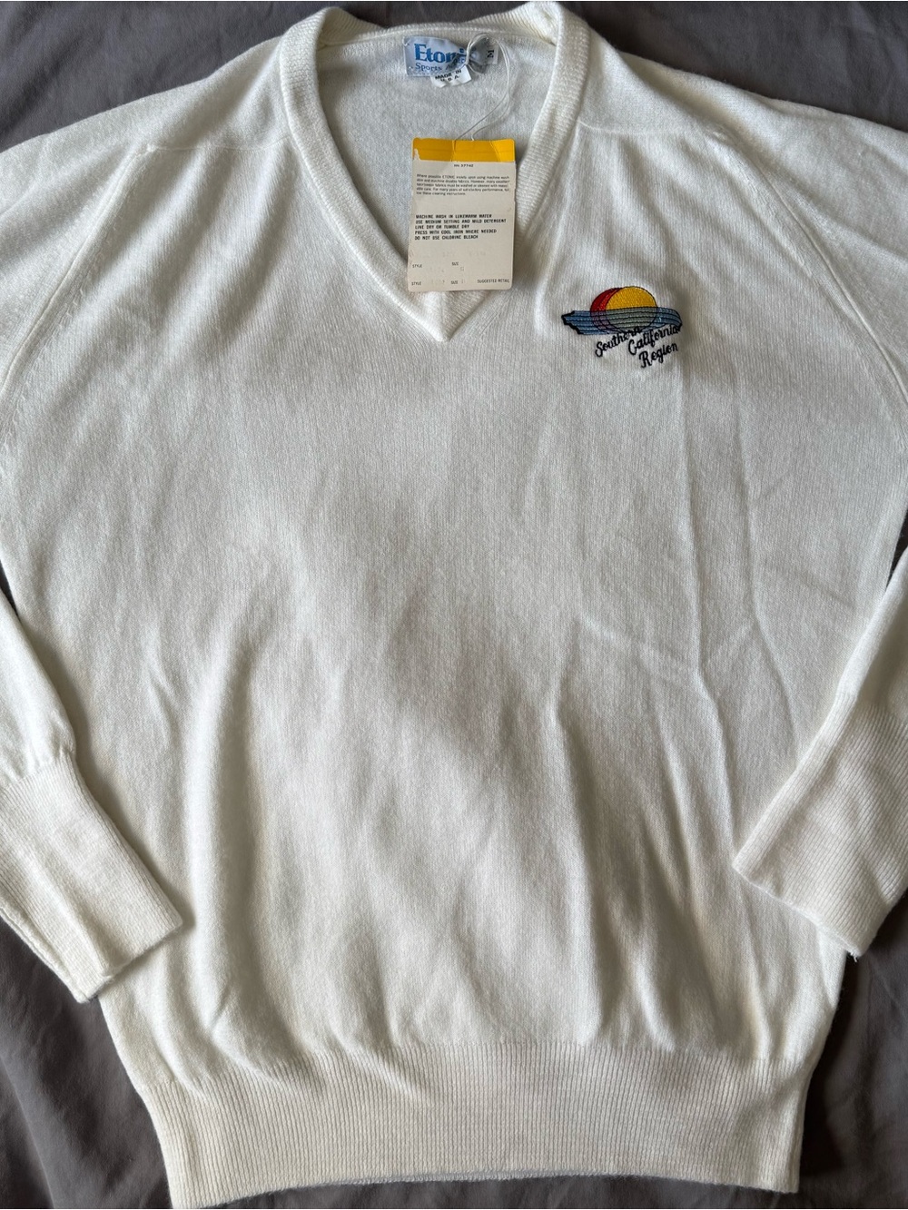 Eton White V-Neck Sweater with Sunset Crest Embroidery